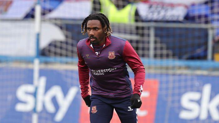 Josh Eppiah in Northampton Town training kit