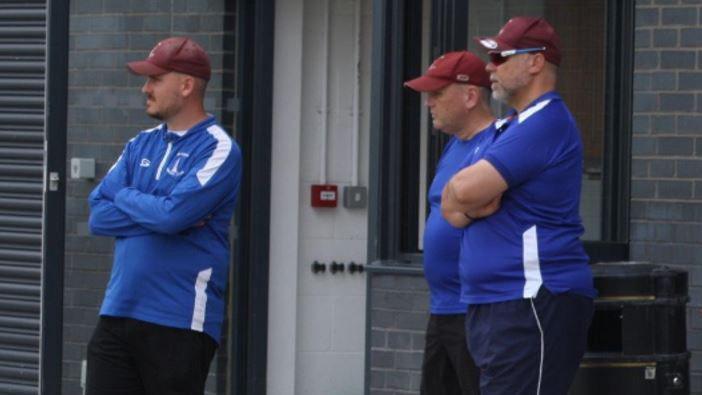 Ben Cross (left) during a training session with two other coaches. 