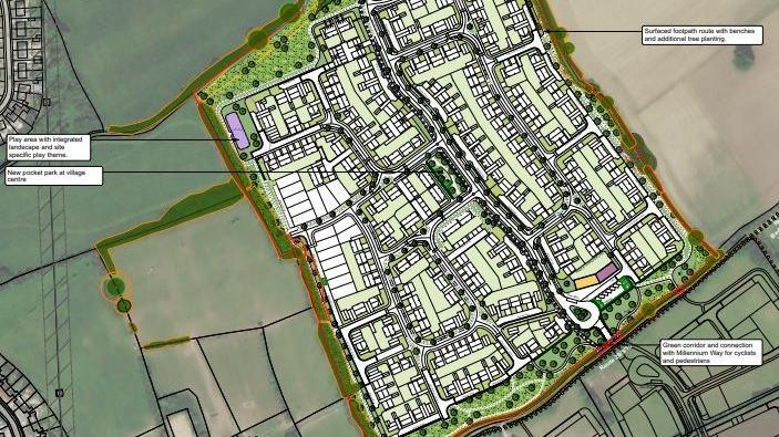 A site plan for up to 380 homes in a green area.