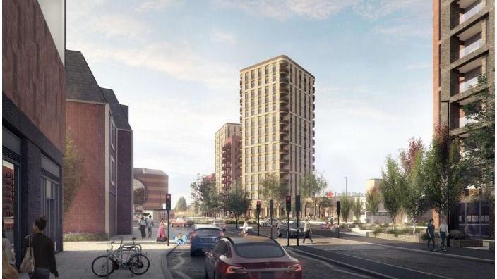 A planned street scene showing a tower block over a train station redevelopment