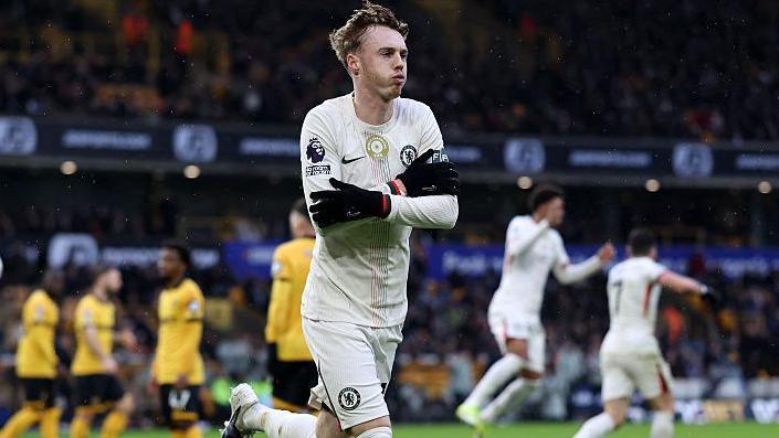 Cole Palmer celebrates scoring against Wolves