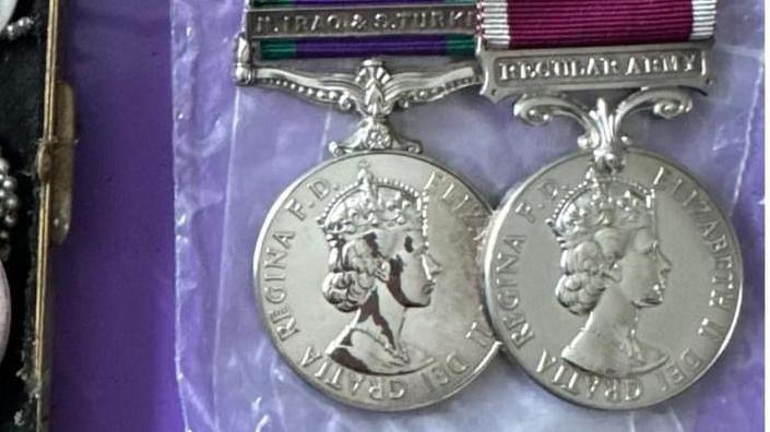 Picture of two war medals found during a litter pick in Plymouth 