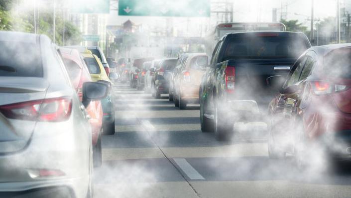 Car engine emissions on the road