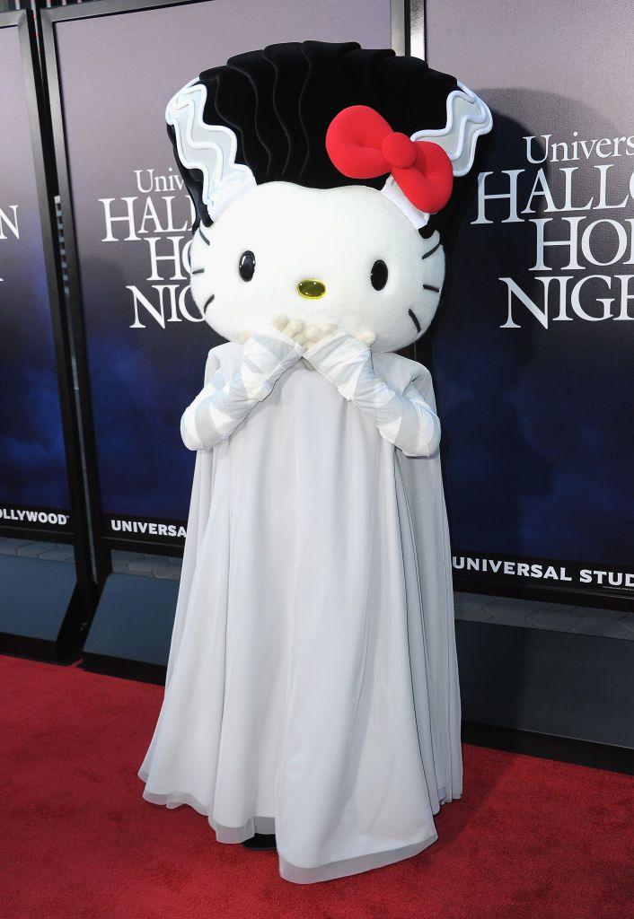 Hello Kitty appears on the red carpet dressed as the Bride, with the long white gown and beehive hairstyle