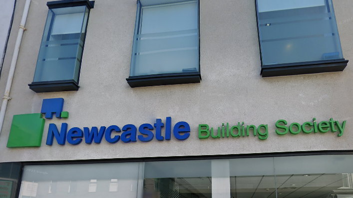 Close up image of blue and green NBS logo