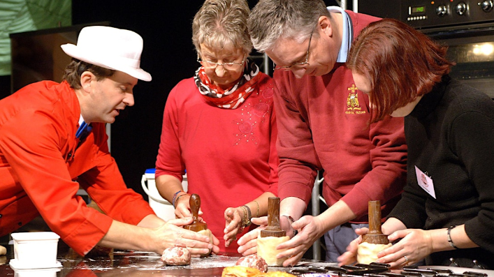 Demonstration of pie making to visitors 
