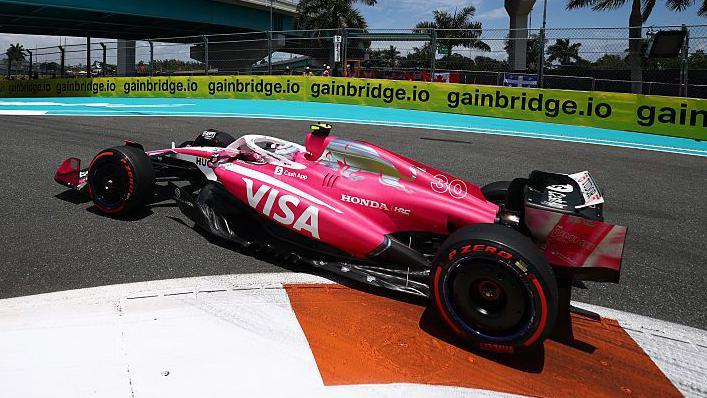 Liam Lawson drives the pink Racing Bulls
