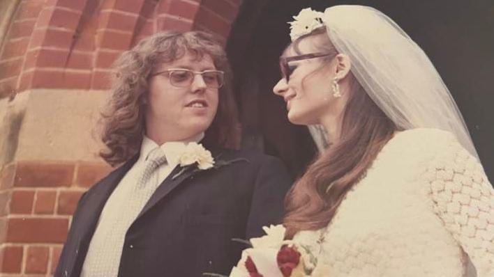 Ian Ball, looking at his wife, Jan Ball, outside a church, after they were married in 1973