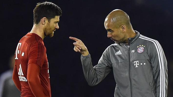Xabi Alonso (left) and Pep Guardiola