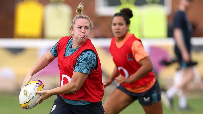 Marlie Packer passing the ball