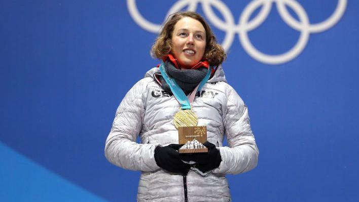 Laura Dahlmeier with a gold medal at the 2018 Winter Olympics