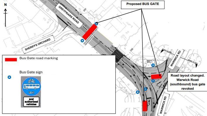 A diagram of a road layout showing a greyed out map with red rectangles showing where proposed bus gate will go