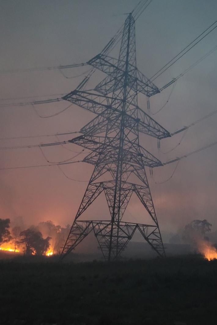 Wildfire near electricity tower