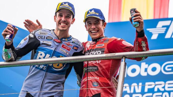 Marc Marquez celebrates with his brother Alex Marquez
