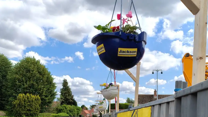 Hard hats with flowers in them