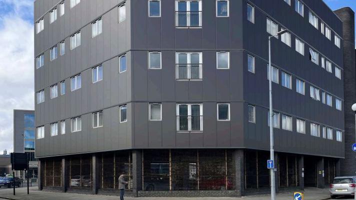 Artist's impression of what the new grey-coloured cladding will look like.