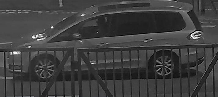 A photo of a silver car, taken from what appears to be CCTV footage