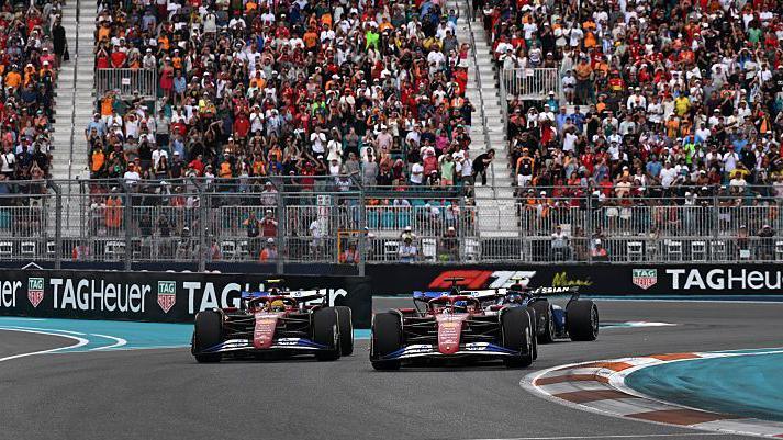 Charles Leclerc approaches a corner just slightly ahead of Ferrari team-mate Lewis Hamilton