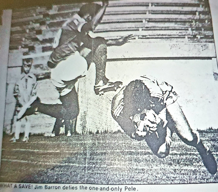 A newspaper cutting showing a picture of Pele jumping over goalkeeper Jim Barron