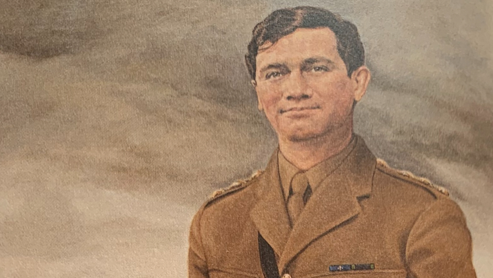 An oil painting of Capt Nairac in his brown British Army uniform