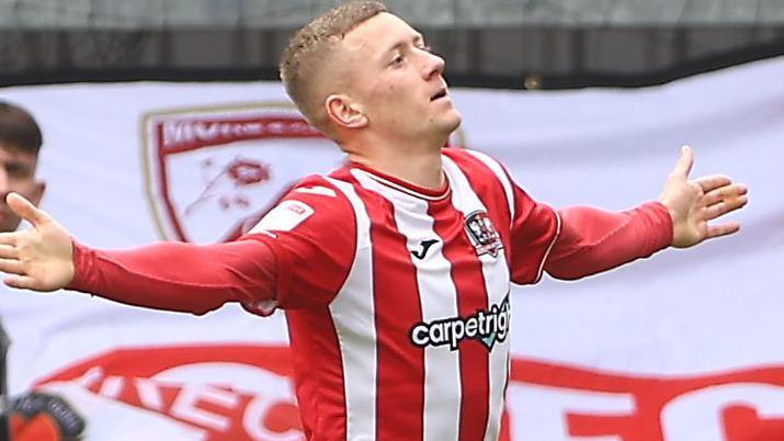 Jay Stansfield celebrates scoring for Exeter City in 2023