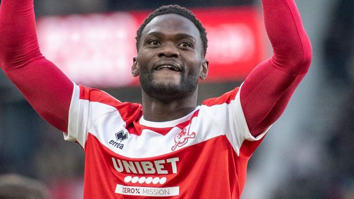 Former Middlesbrough striker Emmanuel Latte Lath celebrates a goal against Cardiff City