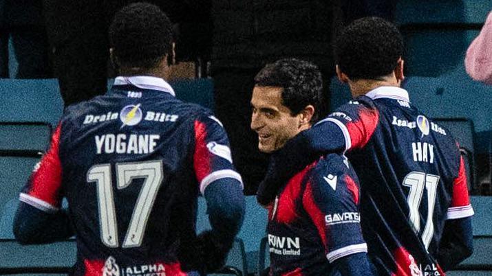 Dundee's Yan Dhanda (centre left) celebrates with his team mates after scoring to make it 1-0 during a William Hill Premiership match between Dundee and Falkirk at Dens Park