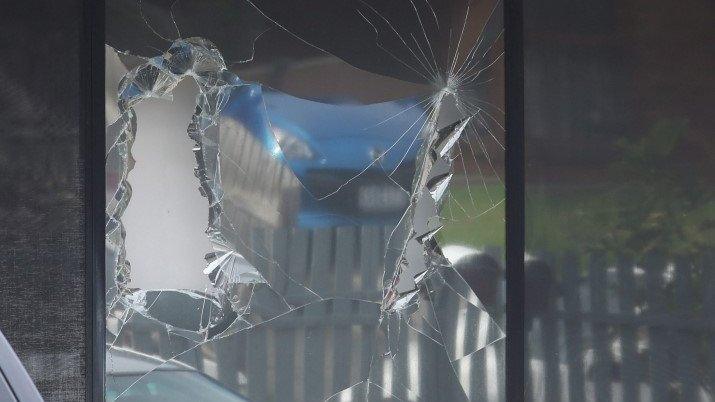 A broken window from a police raid at a house in Hallam, a suburb of Melbourne, where police made one of several arrest during terror raids in Melbourne, Australia, 18 April 2015