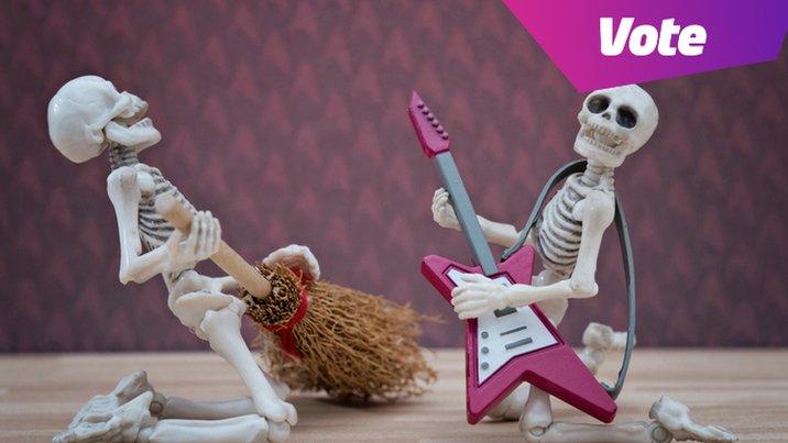 skeletons playing guitar