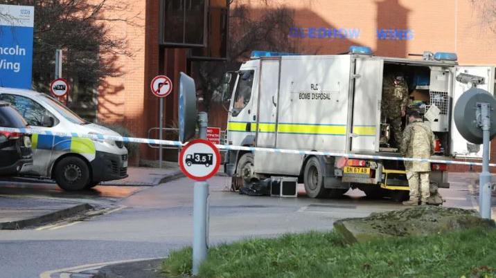 Police and a bomb squad at a hospital in Leeds