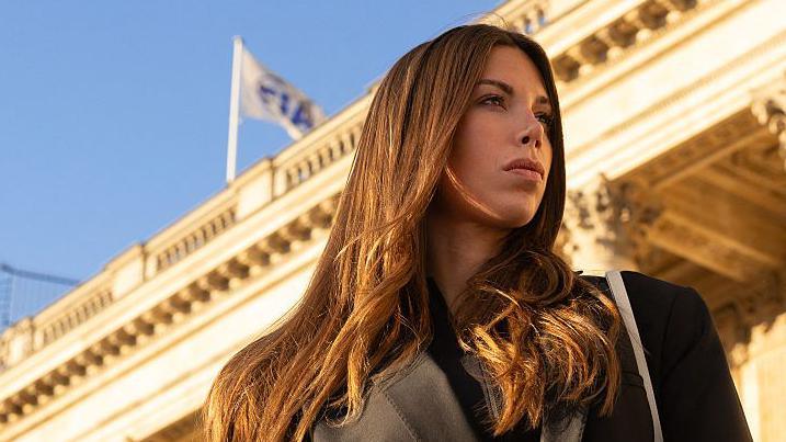 Laura Villars poses in front of the FIA headquarters in Paris in October 2025