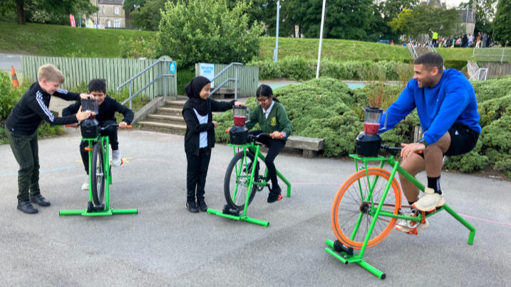 Steel and some children on smoothie bikes 