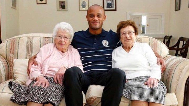 Man City's mascots with Vincent Kompany