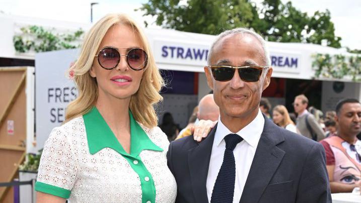 Amanda Cronin and Andrew Ridgeley attend day 2 of the Wimbledon Tennis Championships 2022 at All England Lawn Tennis