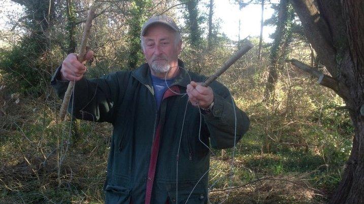 Geoff Holman with one of the snares