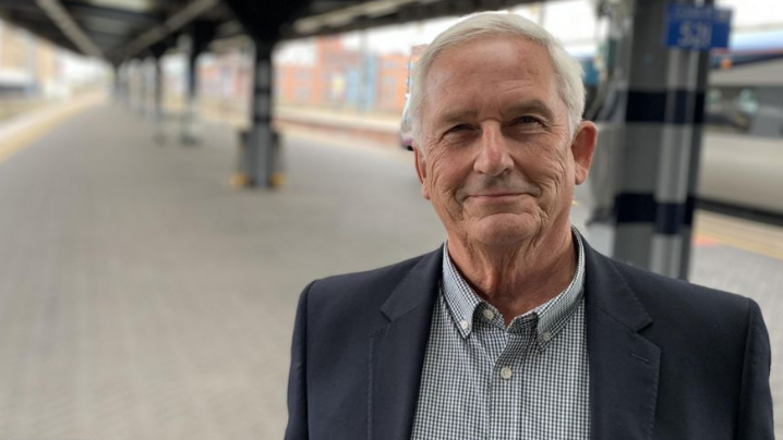 Glen Sanderson, leader of Northumberland County Council at a railway station 