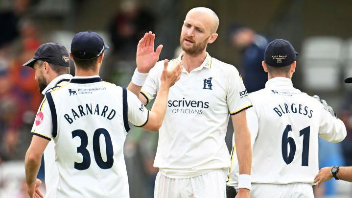 Olly Hannon-Dalby celebrates yet another Bears wicket