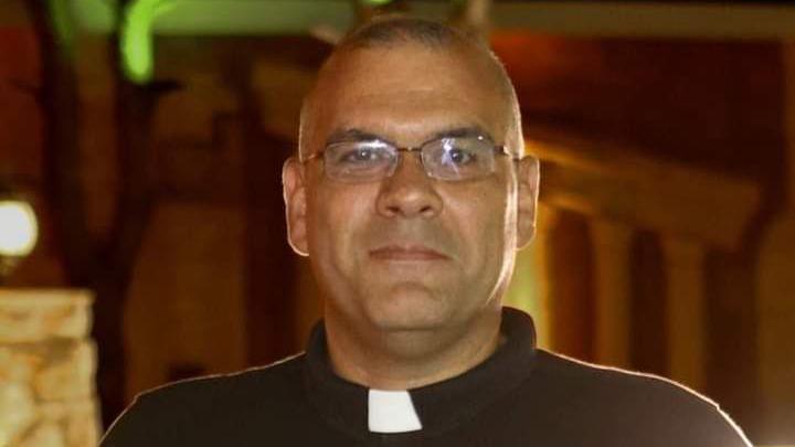 Father George al-Ameel, a priest and teacher in Rmeish