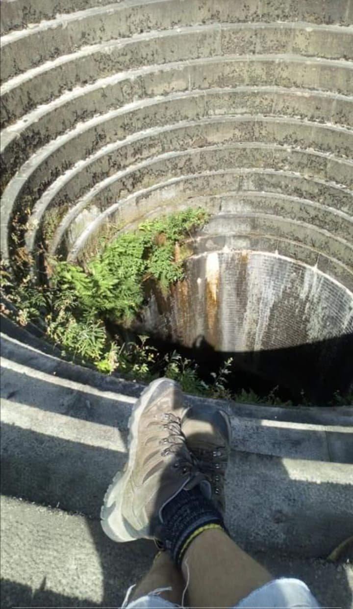 Andy Tingle's feet by the Ladybower Reservoir "plug hole"