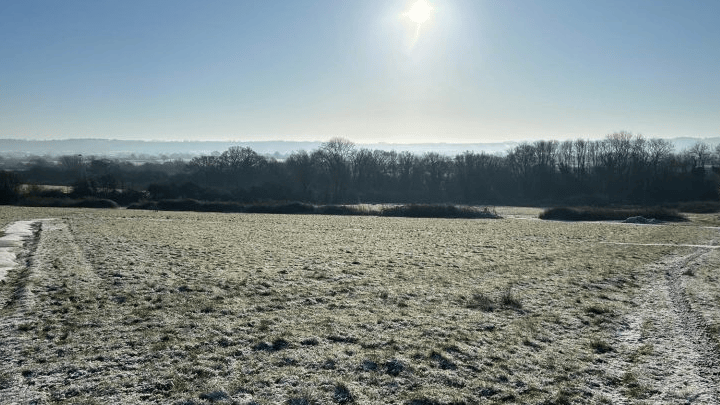 The park in Royal Wootton Bassett. It has a number of fields, with hedging separating them.