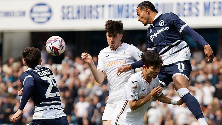 Femi Azeez wins a header for Millwall