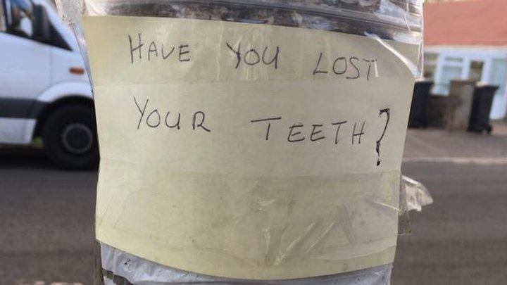 The sign about the false teeth