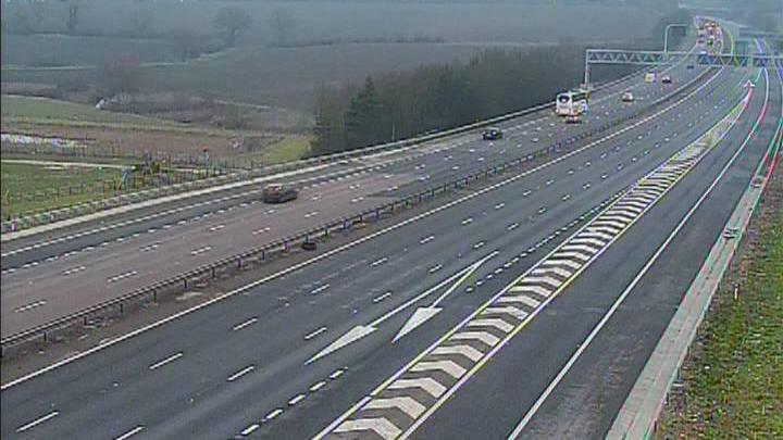 A view from a motorway camera shows one side of the M11 completely empty and the other side very quiet.