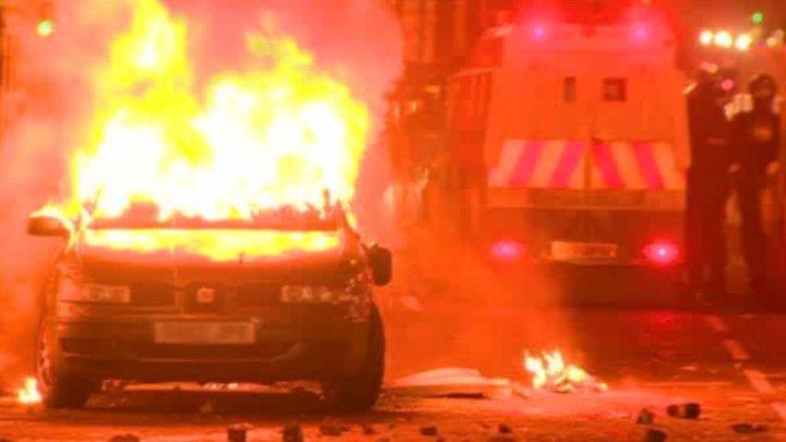 Car on fire during protest