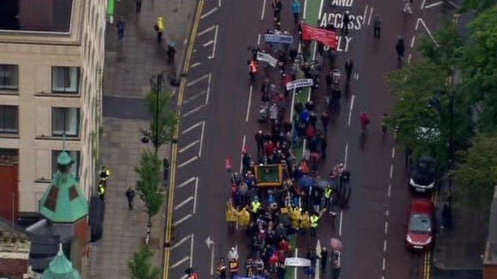 An anti-G8 protest rally is under way in Belfast amid a major security presence