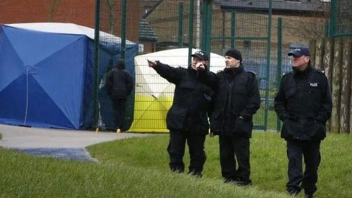 Police survery the playground where Jalal Uddin was murdered