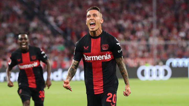 Alex Grimaldo celebrates scoring against Bayern Munich