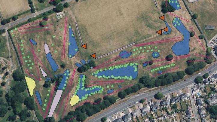 An aerial view of Central Park Golf Course with annotations of lines, circles and triangles representing the planting schedule.