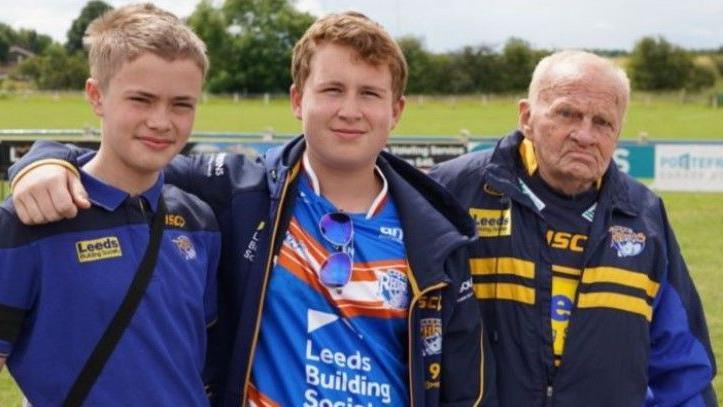 John Germaine WITH grandson Charlie Germaine and James Smith at Featherstone Rovers for the funeral of Rob Burrow