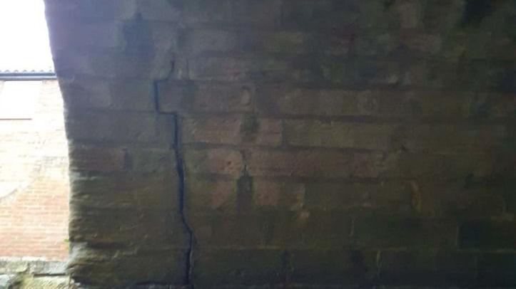 A visible crack in the bridge